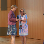 Susan Leavitt '83 accepts the Frances Liebenow Armstrong '36 Service Award from Jenifer Blair '82. Photo by Karen Pearlman.