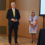 Jay Dugger '90 receives the Distinguished Alumni Award while Jenifer Blair '82 looks on. Photo by Karen Pearlman.