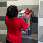 The Aunt Flow machines can be found in the Cedric Rucker University Center, the Eagle's Nest, the Hurley Convergence Center and the UMW Fitness Center. Martina will continue stocking menstrual supplies in baskets in other public bathrooms across campus. Photo by Sam Cahill.