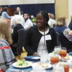 Sophomore Docia Atanda, the recipient of the Bernard L. Mahoney Jr. Student Research Fellowship in Science chats with the late professor's wife, Kathleen Mahoney. Photo by Karen Pearlman Photography.