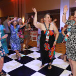 Alumni show off their best moves on the dance floor during the all-class party on Saturday evening. Photo by Karen Pearlman.