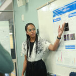 Max W. De La Cruz Morrobel presents her findings on the expression of plasmodesmal regulatory genes in response to brassinosteroids. Photo by Karen Pearlman.