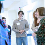 From left: seniors Maddie Baylor, Nate Huff, and Alex Lagon show Janet Hedrick '73 costumes from recent UMW Theatre productions. Janet and her classmates established the Class of 1973 Reunion Scholarship. Photo by Karen Pearlman.