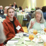 Senior Abby Knowles, who earned the Penelope Ann Parrish Internship in Journalism, enjoys a conversation with her donor, Penny Parrish, and fellow journalism scholarship recipient Norah Walsh and her donor, Jeanette Cadwallender. Photo by Karen Pearlman.