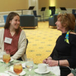 Senior Jessica Oberlies, recipient of the John C. and Jerri Barden Perkins '61 CAS Student Research Endowment, chats with her donor, Dr. Jerri Barden Perkins '61. Photo by Karen Pearlman.