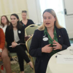 Student Alumni Ambassador Corbin Poyer '24, who is the student representative to the Alumni Board, poses a question to one of the presenters. Photo by Karen Pearlman.