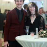 Ella Peck and a guest enjoy themselves at the Senior Toast before attending Grad Ball. Photo by Karen Pearlman.