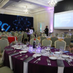 With science as the theme of the evening, tables were adorned with beakers, flasks, and other laboratory tools. Photo by Karen Pearlman Photography.
