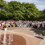 After being welcomed into the Mary Washington alumni family, the Class of 2024 poses for a photo outside the Jepson Alumni Executive Center. Photo by Karen Pearlman.