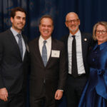 President Troy Paino and wife Kelly pose with Ron Pohl, attorney and friend of Irene Piscopo Rodgers '59, and his son, Remy Pohl, a 2016 alum of Mary Washington. Photo by Karen Pearlman Photography.