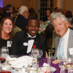 From left: Daryl-Sue Mueller, UMW sophomore Aloysius Kabonge, and Hunter Morin at the Celebration of Giving. Photo by Karen Pearlman Photography.