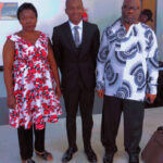 Aloysious poses for a photo with his parents at the airport before coming to the United States to attend Mary Washington. Photo courtesy of Aloysious Kabonge.