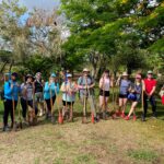 UMW students plant trees for a forest restoration project in the Galápagos Islands. For more than a decade, Sally Brannan Hurt's scholarship has helped dozens of students visit one of the most biodiverse places on the planet. Photo courtesy of Professor of Biology Andrew Dolby.