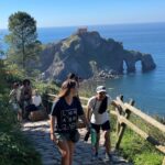 UMW students Jessica Oberlies (left) and Jazmine Montecino return from a hike to San Juan de Gaztelugatxe last summer during a 'UMW in Spain' study abroad trip. The experience is one of Mary Washington's three longest-running faculty-led study abroad programs offered through the Center for International Education. #MaryWashDay #TogetherUMW