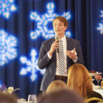 Senior Hollis Cobb explained how the UMW community supported his nonprofit library-on-wheels, Bookmobile Fredericksburg. Photo by Tom Rothenberg.