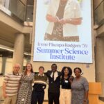 Aloysious (third from right) poses for a photo with his Department of Mathematics faculty mentors, Professors Melody Denhere and Leo Lee, and classmates after the Irene Piscopo Rodgers '59 Summer Science Institute Symposium in July 2024. Photo courtesy of Aloysious Kabonge.