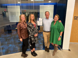 Helen's children (from left) Ann, Lee, Ben, and Mary Margaret visited the University of Mary Washington on Nov. 21 to dedicate the Mason Team Room in honor of their late parents.