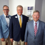 From left: Rob Strassheim ’96, COB Interim Dean Ken Machande ’94, and Professor Emeritus of Business Law and Taxation Leigh Frackelton in front of the classroom. Photo by Suzanne Carr Rossi.