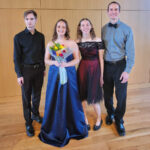 Sofia (second from left) with cellist Riley Francis (left), flautist Madeline MacArthur, and Assistant Professor of Music Robert Wells (right) after her senior vocal recital in the Weatherly Wing in Seacobeck Hall. Photo courtesy of Sofia Taylor.