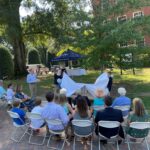 Coby’s sons, Boice and Cole,unveil the memorial bench outside of George Washington Hall at the dedication ceremony at UMW on Sept. 19, 2021. Photo courtesy of John Anstey.