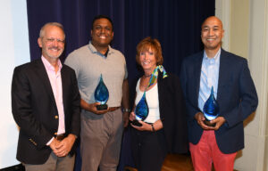 Jerri with President Troy Paino, Jay Sinha '07, and Abas Adenan '85, after receiving Alumni Association Awards at Reunion Weekend in 2019.