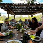 Sally, Dr. Dolby, and other Mary Washington alumni dine al fresco in Africa on the UMW Alumni on the Road trip. Photo courtesy of Sally Brannan Hurt.