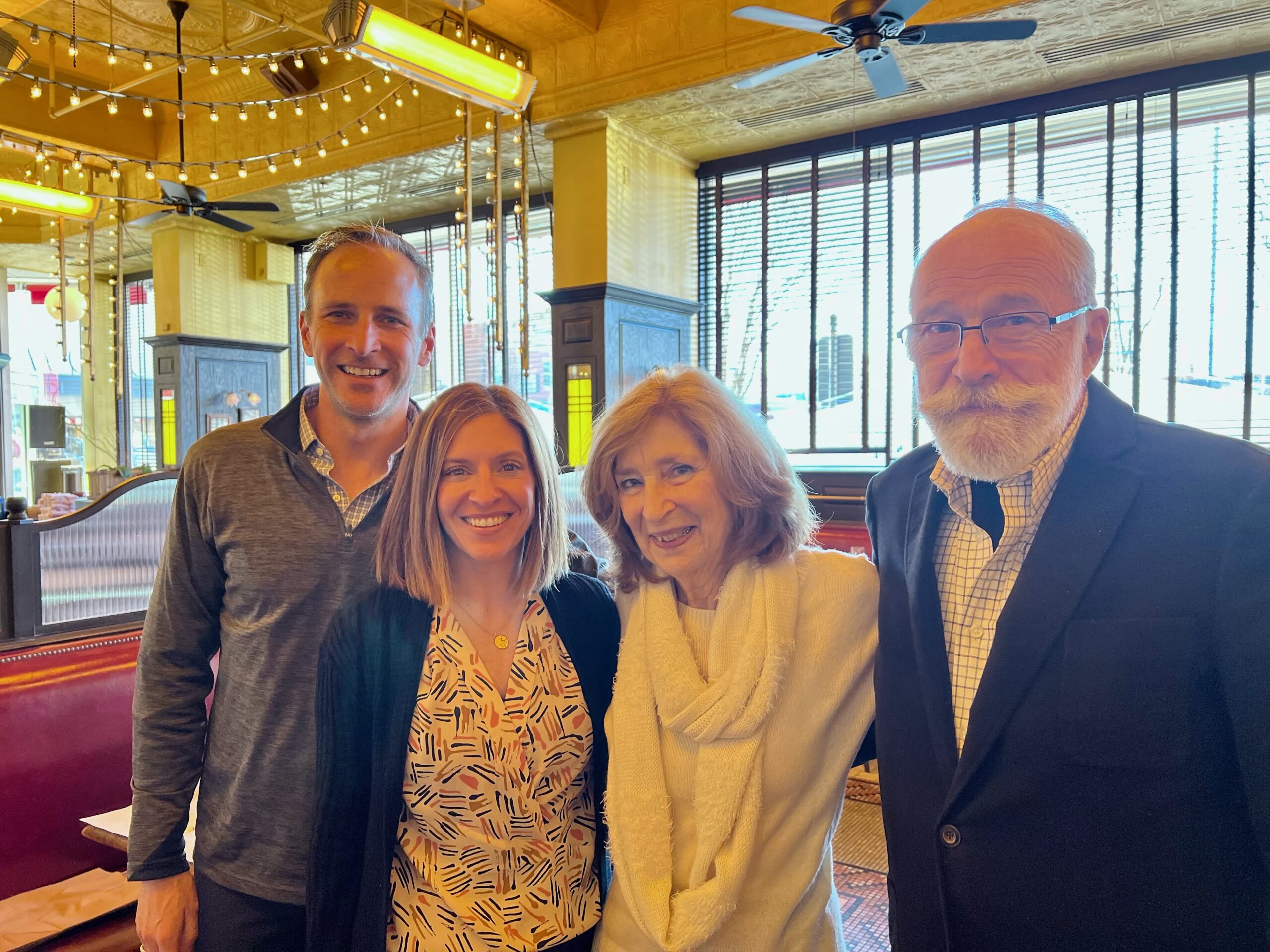 Rob Strassheim '96 and Sarah Strassheim '01 at lunch with Dr. deGraff and his wife, Amy, after sharing the news that they had reached their goal of raising funds to name the Galen deGraff Classroom. Photo courtesy of Rob and Sarah Strassheim.