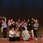 Madeline (second from left) hangs out with members of the Performing Arts Company after its big show in fall 2023. Photo by Chenin Gruber.