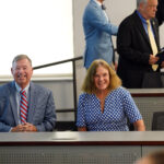 Leigh Frackelton and wife Justin laugh as guests share stories about the professor emeritus, who retired from UMW in 2021. Photo by Suzanne Carr Rossi.