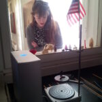 Maggie explores a display at Ferry Farm in Stafford. Visits to George Washington's boyhood home and other historic sites around Fredericksburg influenced her decision to pursue a bachelor's degree in historic preservation at Mary Washington. Photo courtesy of Maggie Lovitt.