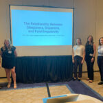 Sofia (far right) with psychology classmates (from left) Valeria Duque, Dayton Keffer, Katherine Blair, and Ally Tingen, before presenting their research on dopamine at 2024's Research and Creativity Symposium. Photo courtesy of Sofia Taylor.