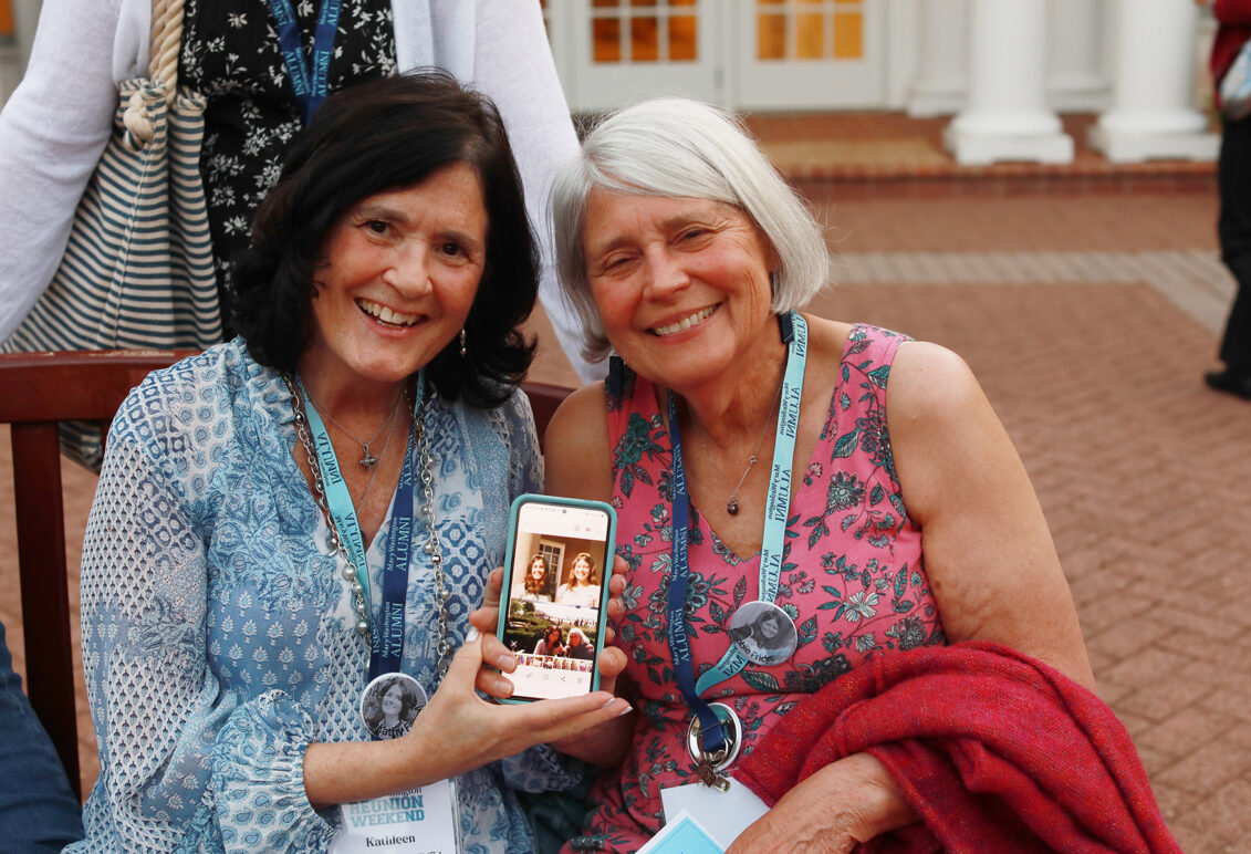1974 alumnae pose for a photo, while also sharing a few of their younger selves, during their 50th reunion dinner at the Jepson Alumni Executive Center. Photo by Karen Pearlman.