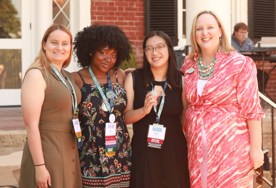 Young alumni pose for a photo with Vice President for Advancement and Alumni Engagement and UMW Foundation Executive Director Katie Turcotte (right) in 2024. Photo by Karen Pearlman.