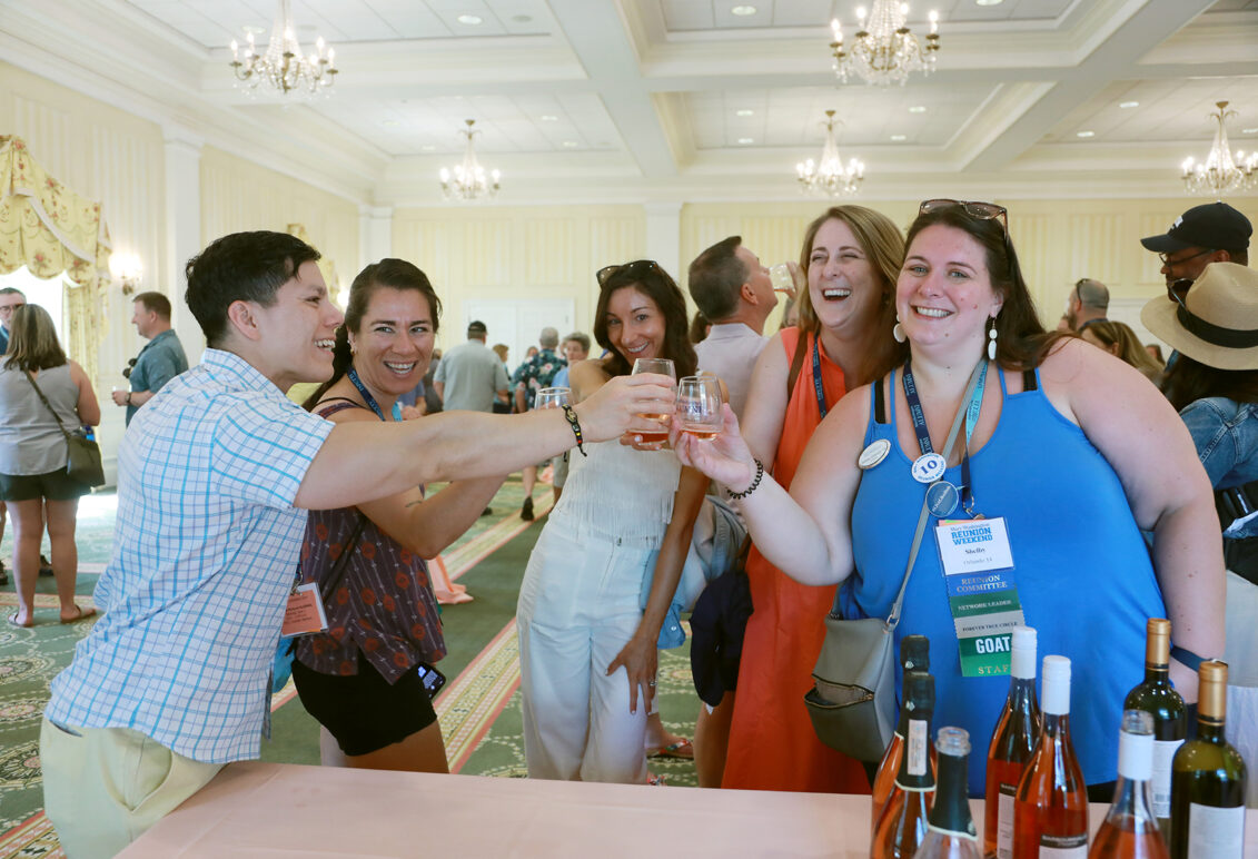 2014 alumni, including Director of Annual Giving Shelby Orlando '14 (right), sample Virginia vintages at the wine, beer, and cider tasting during 2024's Reunion Weekend. Photo by Karen Pearlman.