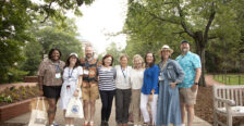 Rachel Selle '05 (second from left) and fellow 2005 alumni join 1980 alumni for a photo on Campus Walk during Reunion Weekend. This year's event celebrated classes ending in 0 and 5, but all graduates are welcome to participate in the annual celebration held at the end of May. Photo by Karen Pearlman.