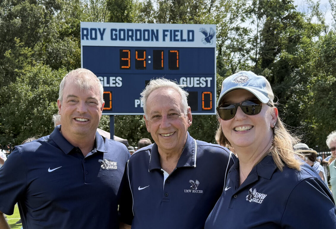 In addition to President Troy Paino, Coach Gordon (center) thanked current UMW Director of Athletics Patrick Catullo '95 (left) and Vice President for Advancement and Alumni Engagement Katie Turcotte (right), who is also executive director of the UMW Foundation. Both worked with dedicated alumni to reach out to men's and women's soccer supporters. Photo courtesy of Katie Turcotte.