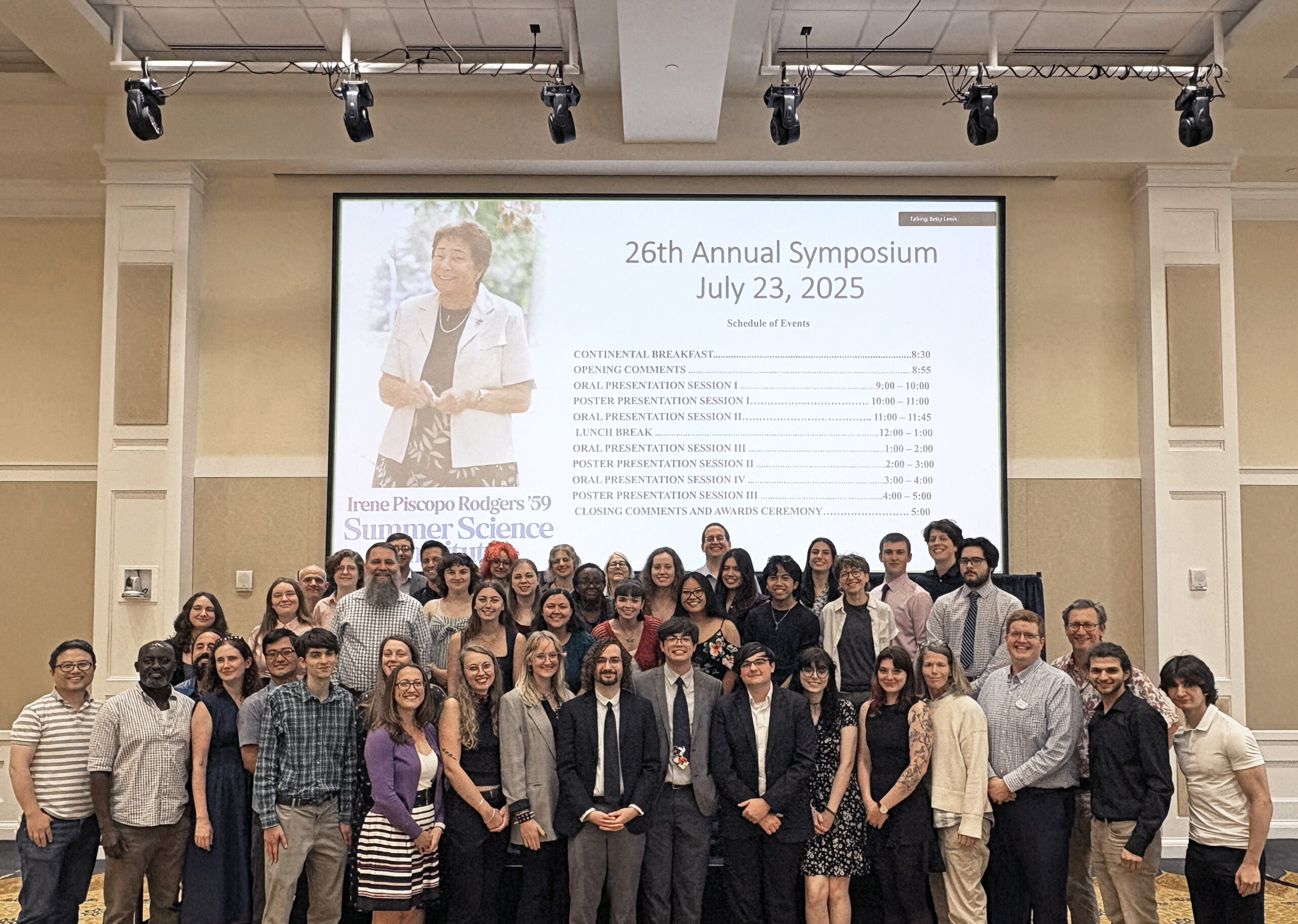 Participants of the Irene Piscopo Rodgers '59 Summer Science Institute pose for a photo with their faculty mentors after the symposium held on July 23 in the Cedric Rucker University Center's Chandler Ballroom. Photo courtesy of Betsy Lewis/College of Arts and Sciences. 