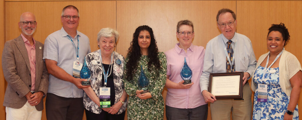 2026 Alumni Award winners pictured with President Paino and with members of the Alumni Board